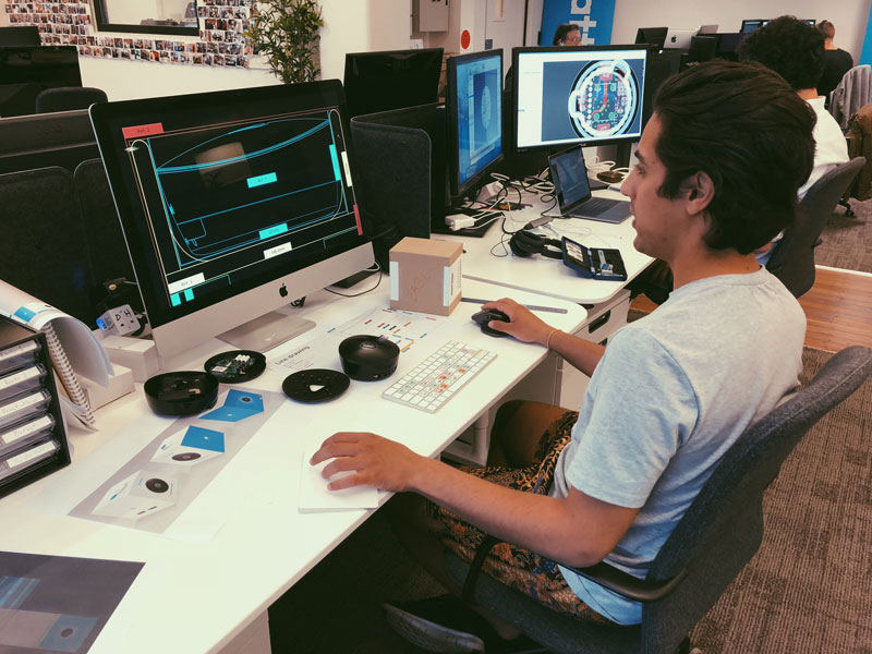 Image caption: Rasmus at work on his big computer (wearing board shorts in Winter) putting the finishing touches to the product packaging and shipping carton designs